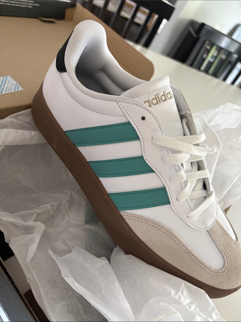 adidas Womans White Sneakers with Teal Stripes and Gum Sole